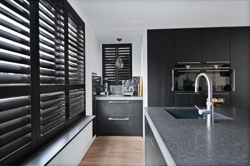 Faux wood shutter